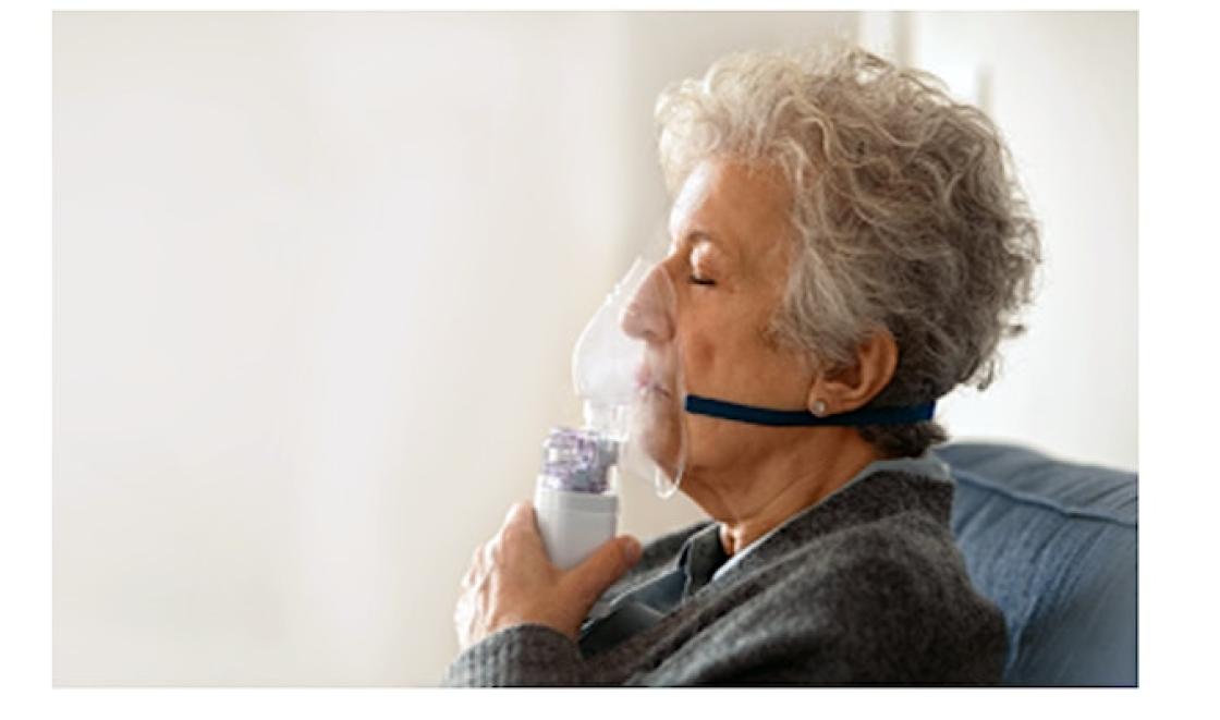 A woman with breathing equipment