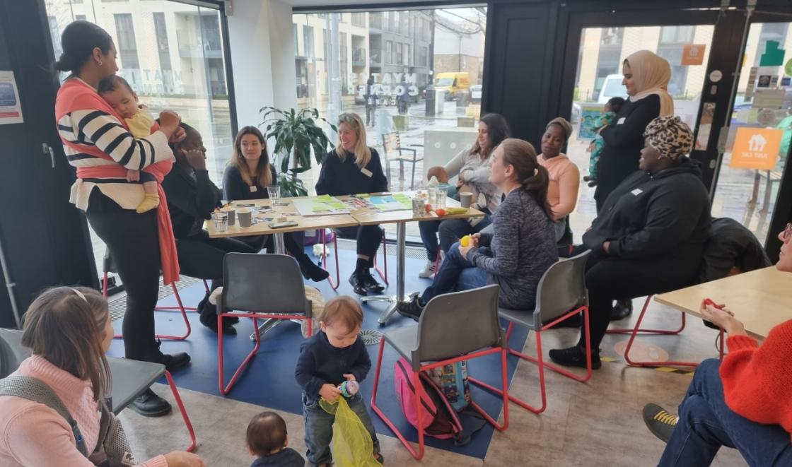 Listening event with babies playing