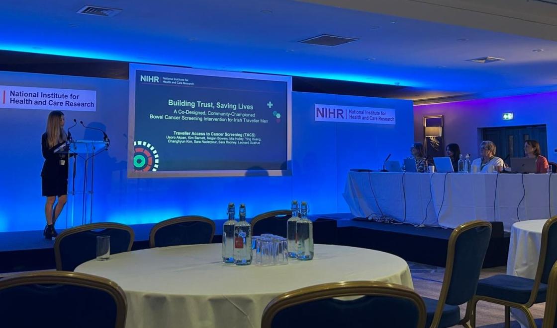 Megan Bowers presenting to the panel at the NIHR Doctoral training camp