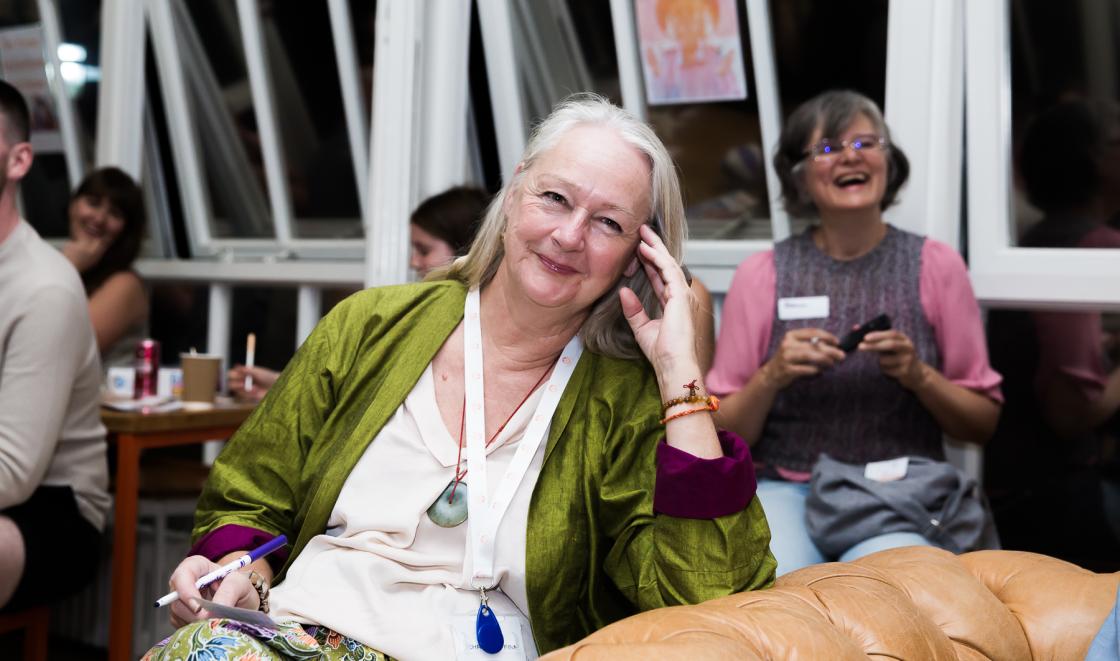 Smiling older lady seated